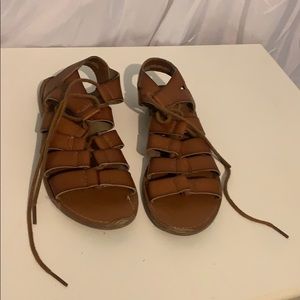 Cross laced sandals